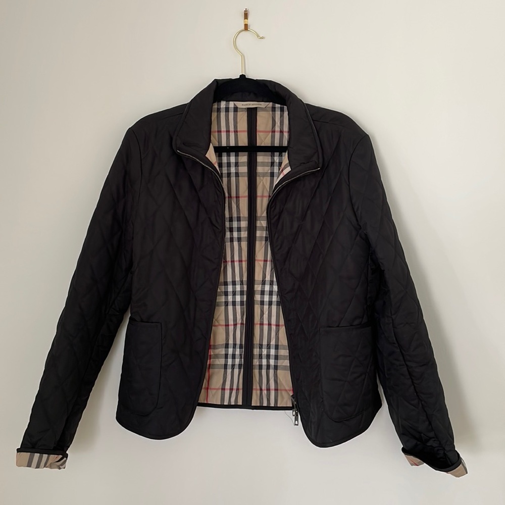 Womens black Burberry quilted jacket in great used condition.